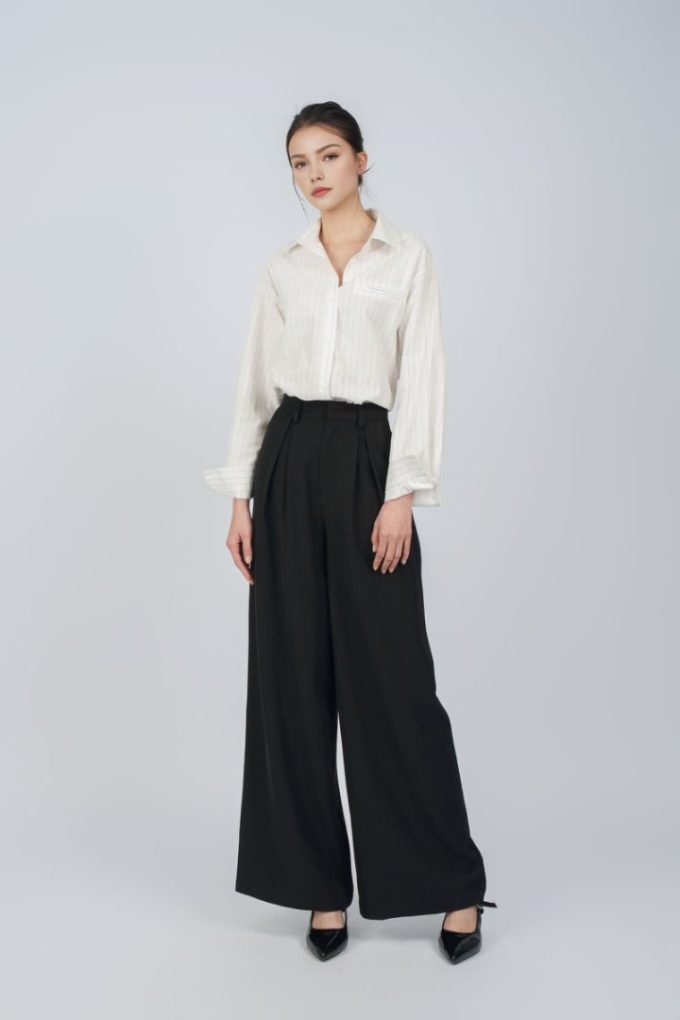 PINGOH  PANTALONE WIDE LEG NERO   Libertà di movimento, minimalismo e funzionalità.